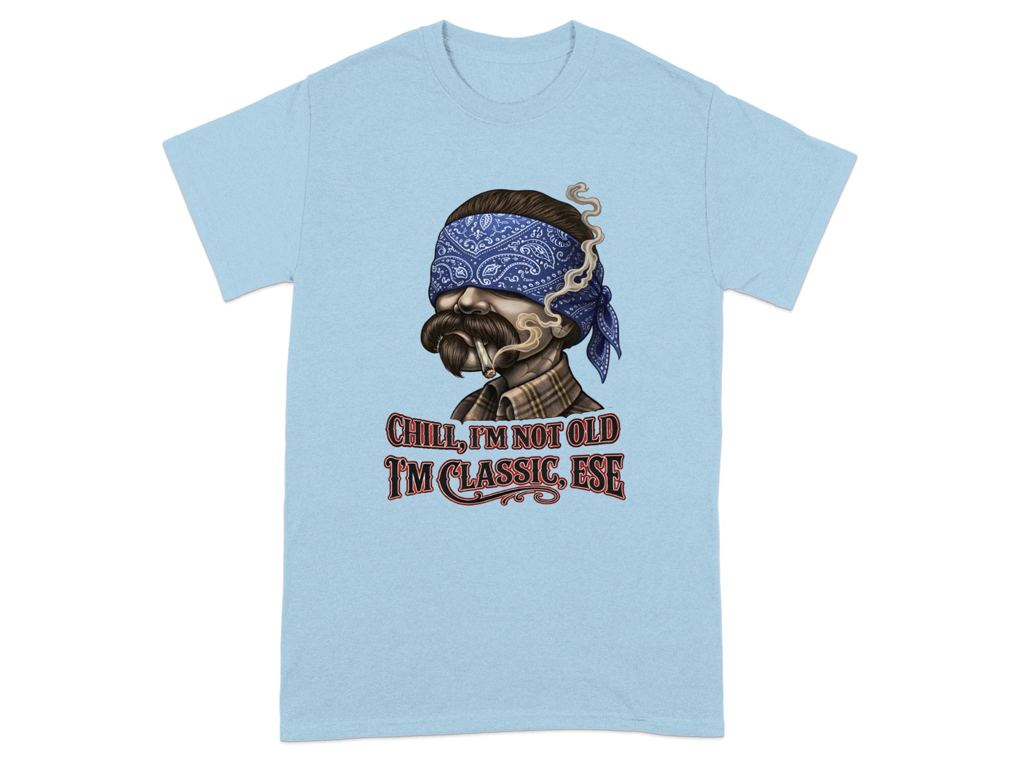 Light blue t-shirt with graphic of man's head wearing bandana, smoking, with text "CHILL, I'M NOT OLD I'M CLASSIC, ESE".