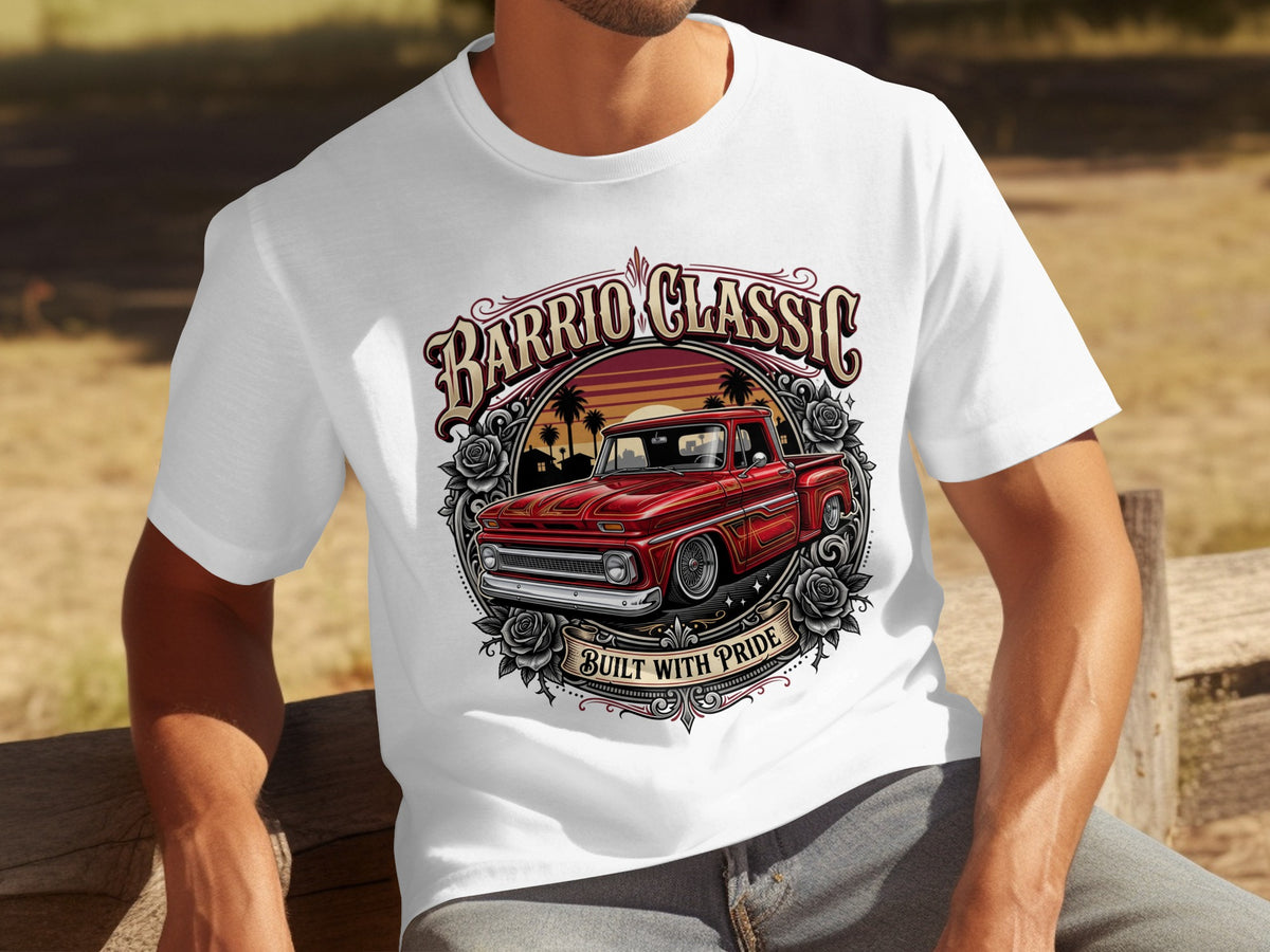 White t-shirt with a red classic truck graphic, "Barrio Classic," and "Built With Pride."