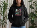 Black hoodie with a colorful graffiti raccoon graphic on the chest.