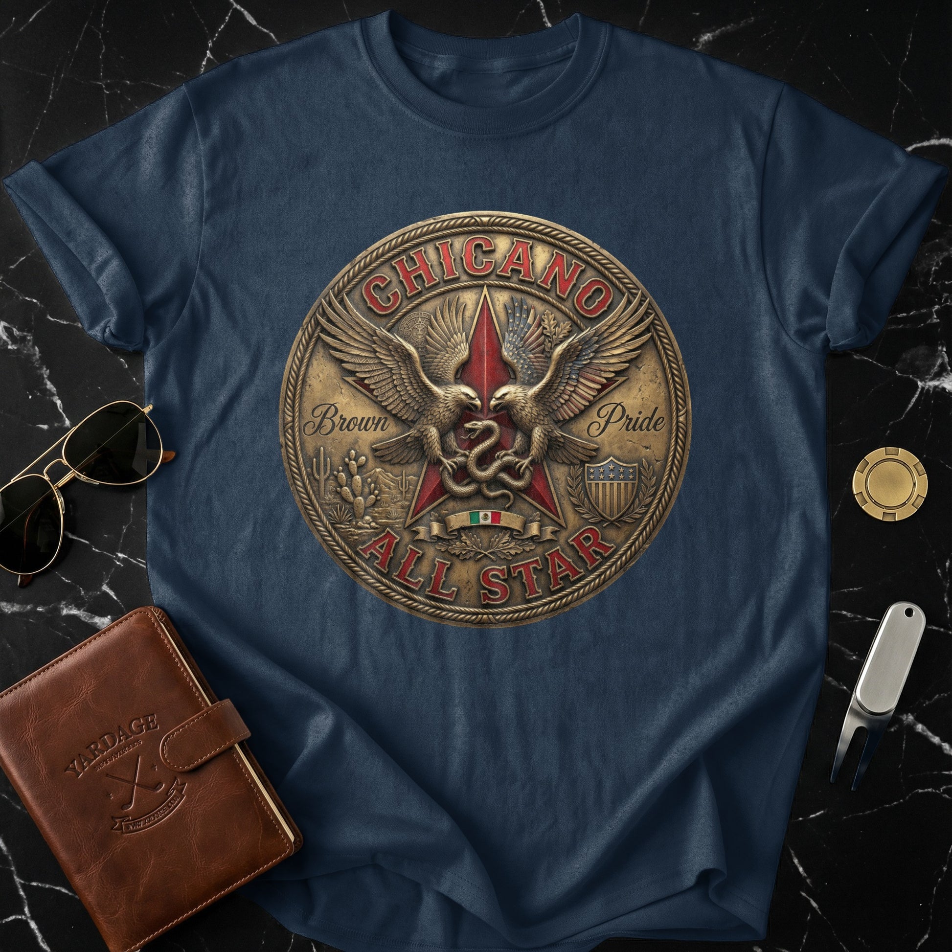 Navy t-shirt featuring a circular emblem with eagles and "Chicano Brown Pride All Star" text.