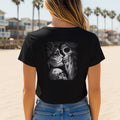 Black t-shirt featuring a Day of the Dead sugar skull design with roses and skulls.