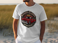 White t-shirt featuring a red classic truck with 