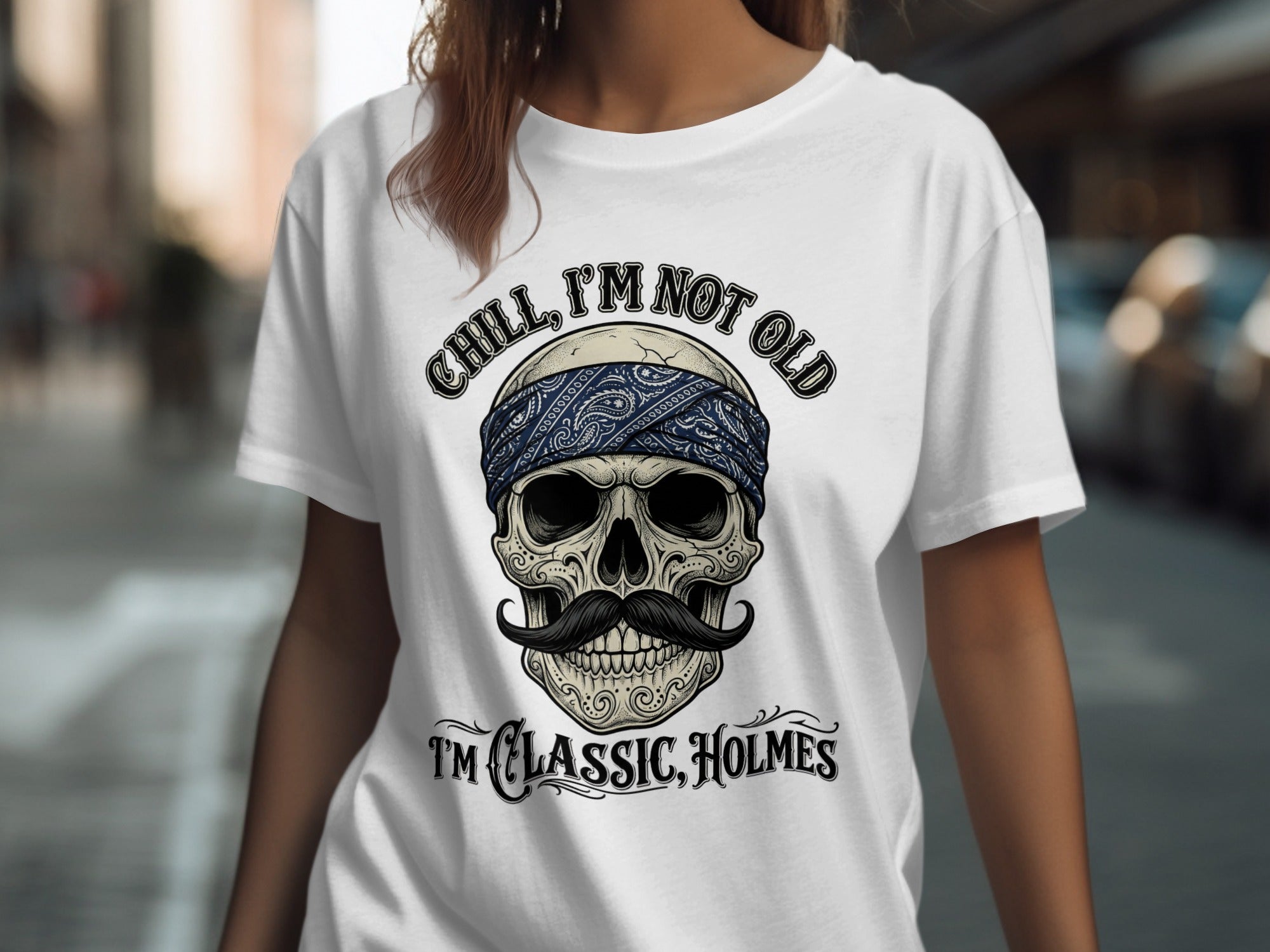 Skull wearing bandana and mustache with text "Chill, I'm not old" and "I'm classic, Holmes."