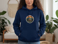 Navy blue hoodie with circular graphic of a van and mountains, text 