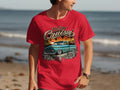 Red t-shirt with graphic of a teal lowrider truck and 