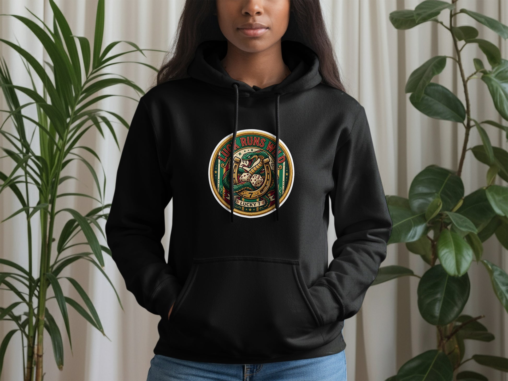 Black hoodie with a circular emblem featuring a horseshoe, dice, and the text "LUCKY 77".