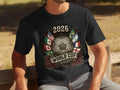 Black t-shirt with 2026 World Cup logo featuring soccer ball and flags.