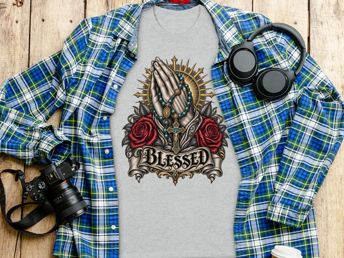 Gray t-shirt with "BLESSED" text, praying hands, rosary, roses, and cross graphic.