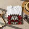 White t-shirt with a colorful sugar skull and red roses design.