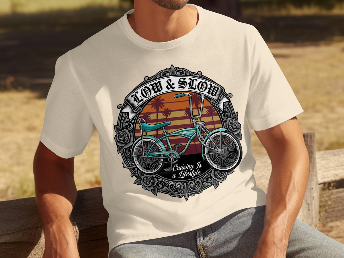 T-shirt with "Low & Slow" text, vintage bicycle, palm trees, and roses design.