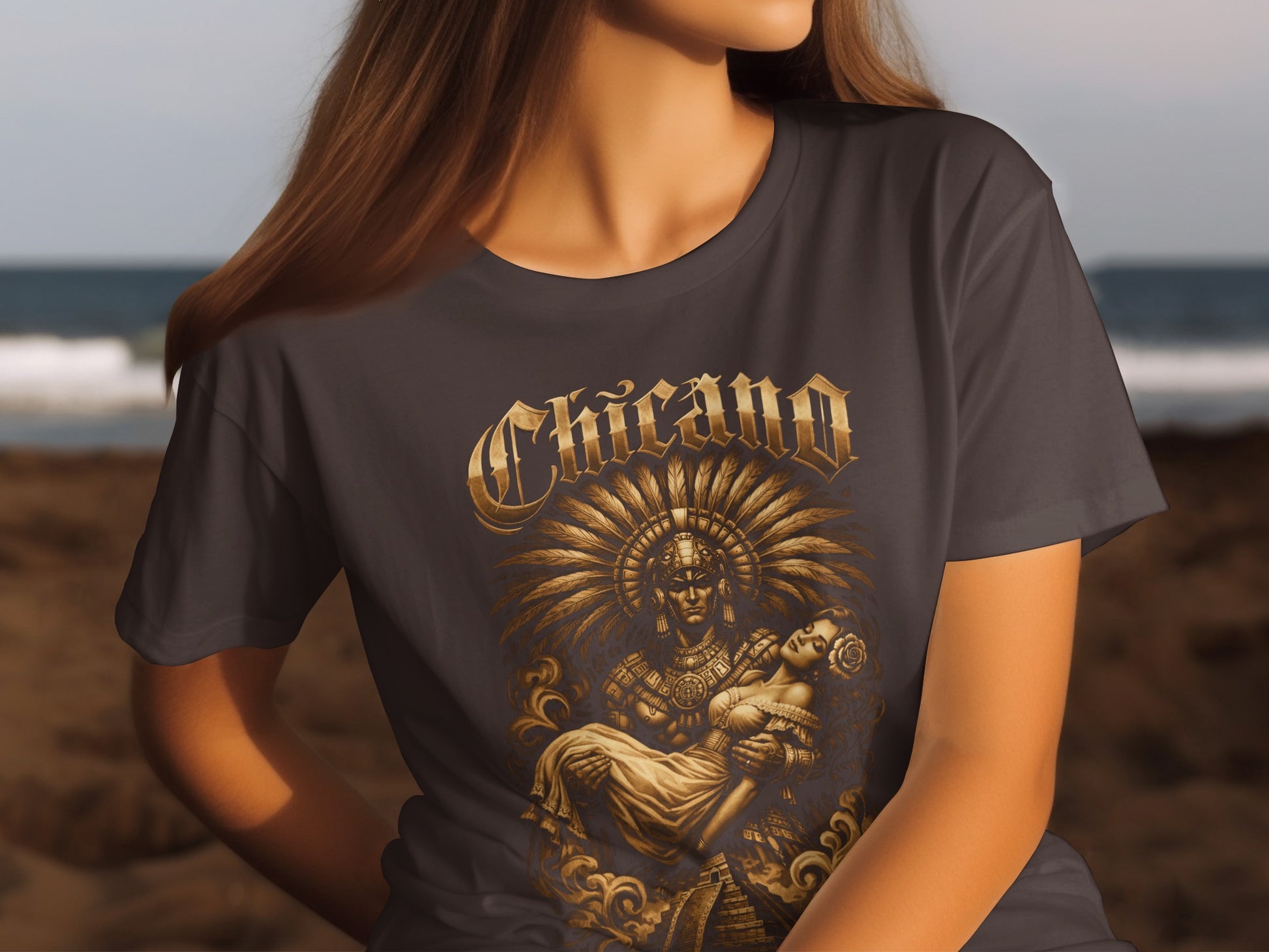 T-shirt graphic depicts a warrior holding a woman, with ornate feather headdress.