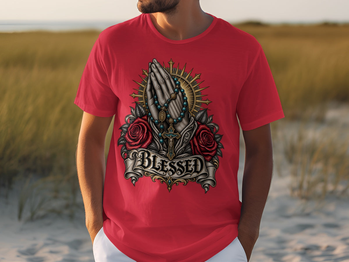 Red t-shirt with praying hands, roses, rosary, cross, and "BLESSED" text.