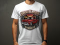 White t-shirt with graphic of red classic truck, sunset, and text 