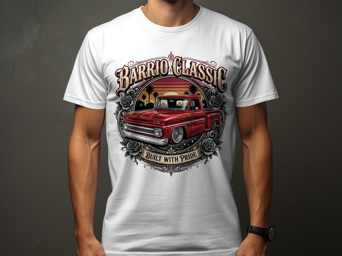 White t-shirt with graphic of red classic truck, sunset, and text "Barrio Classic Built With Pride."