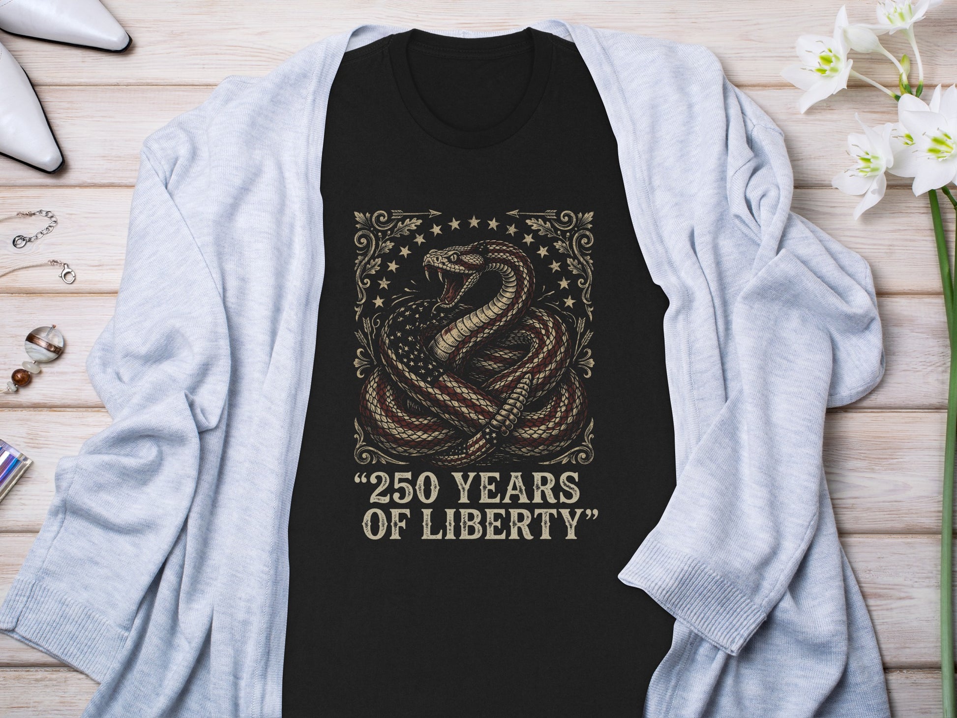 Black t-shirt with a coiled snake and "250 Years of Liberty" text.