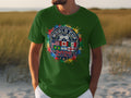 Green t-shirt with World Cup 2026 logo featuring flags and colorful paint splatters.