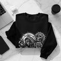Black sweatshirt featuring a Day of the Dead inspired design with skulls and a serene female figure.