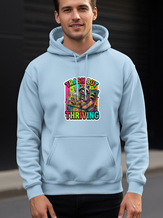 Light blue hoodie with "Trash But Thriving" raccoon graphic.