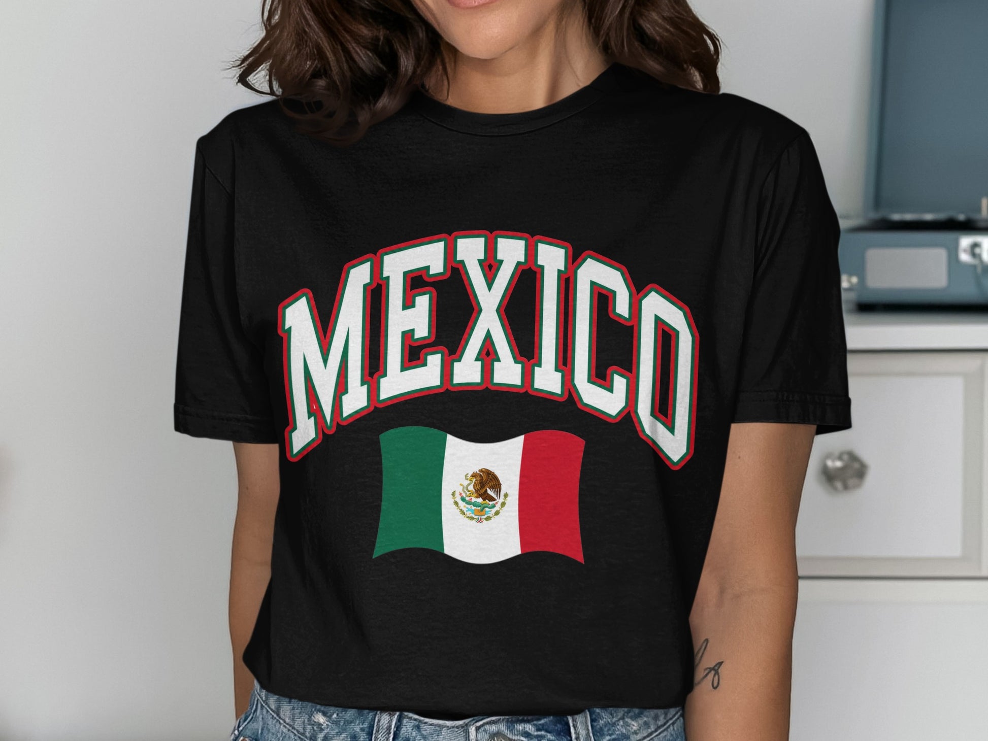 Black t-shirt with "MEXICO" in white lettering and the Mexican flag.