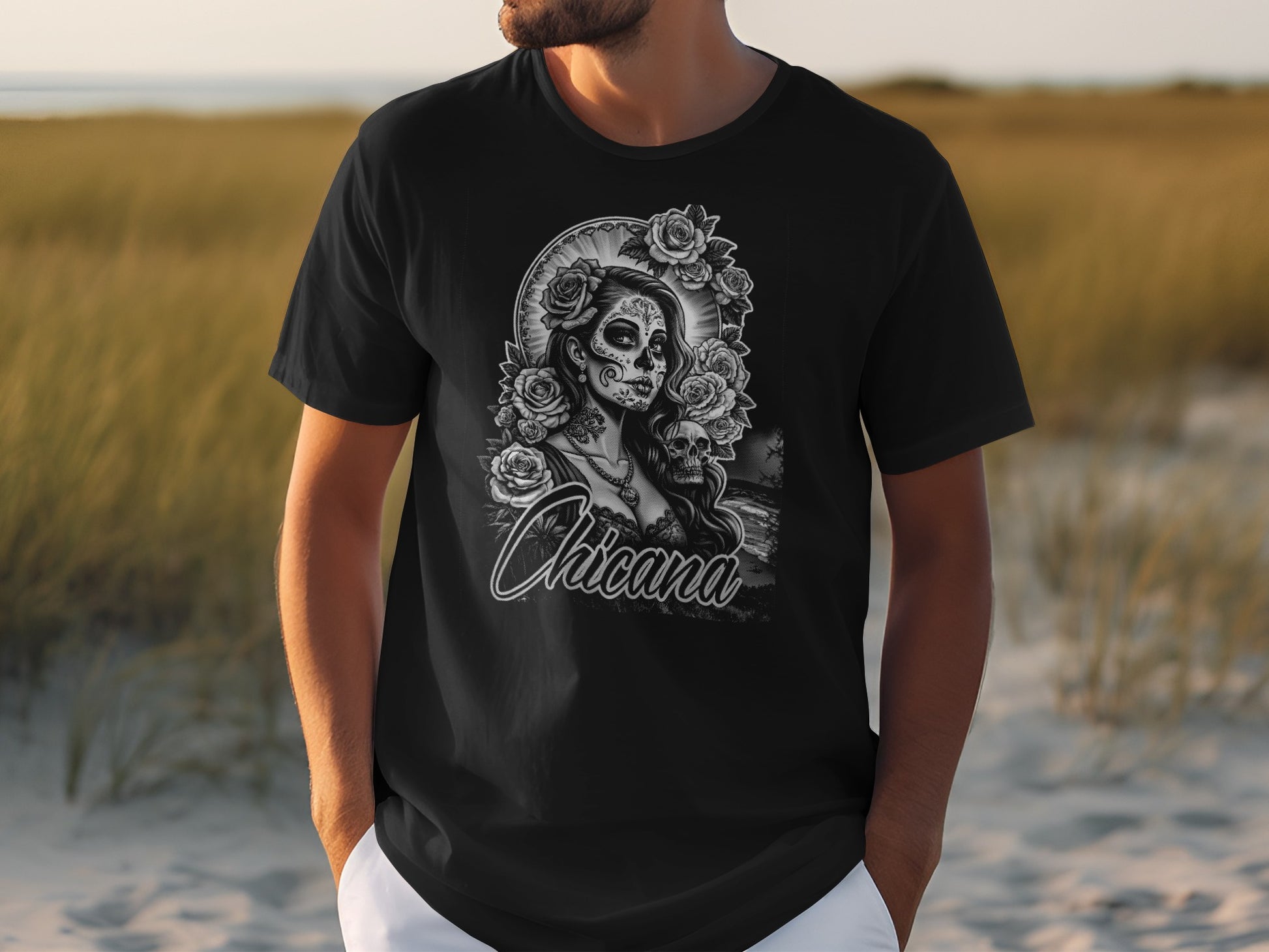 Black t-shirt featuring a sugar skull, roses, and woman's face with "Chicana" text.