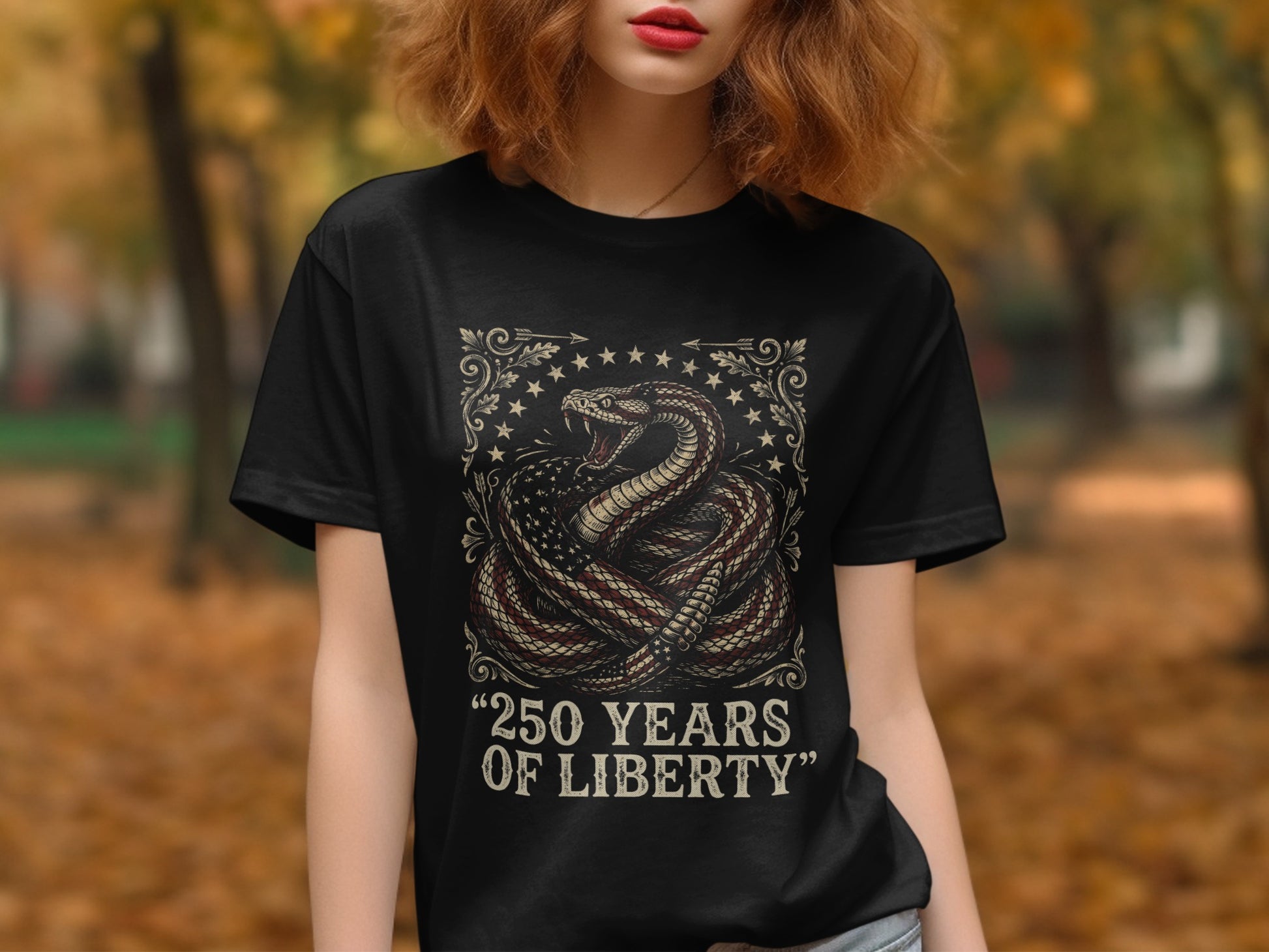 Black t-shirt with coiled snake, American flag, and text "250 YEARS OF LIBERTY".