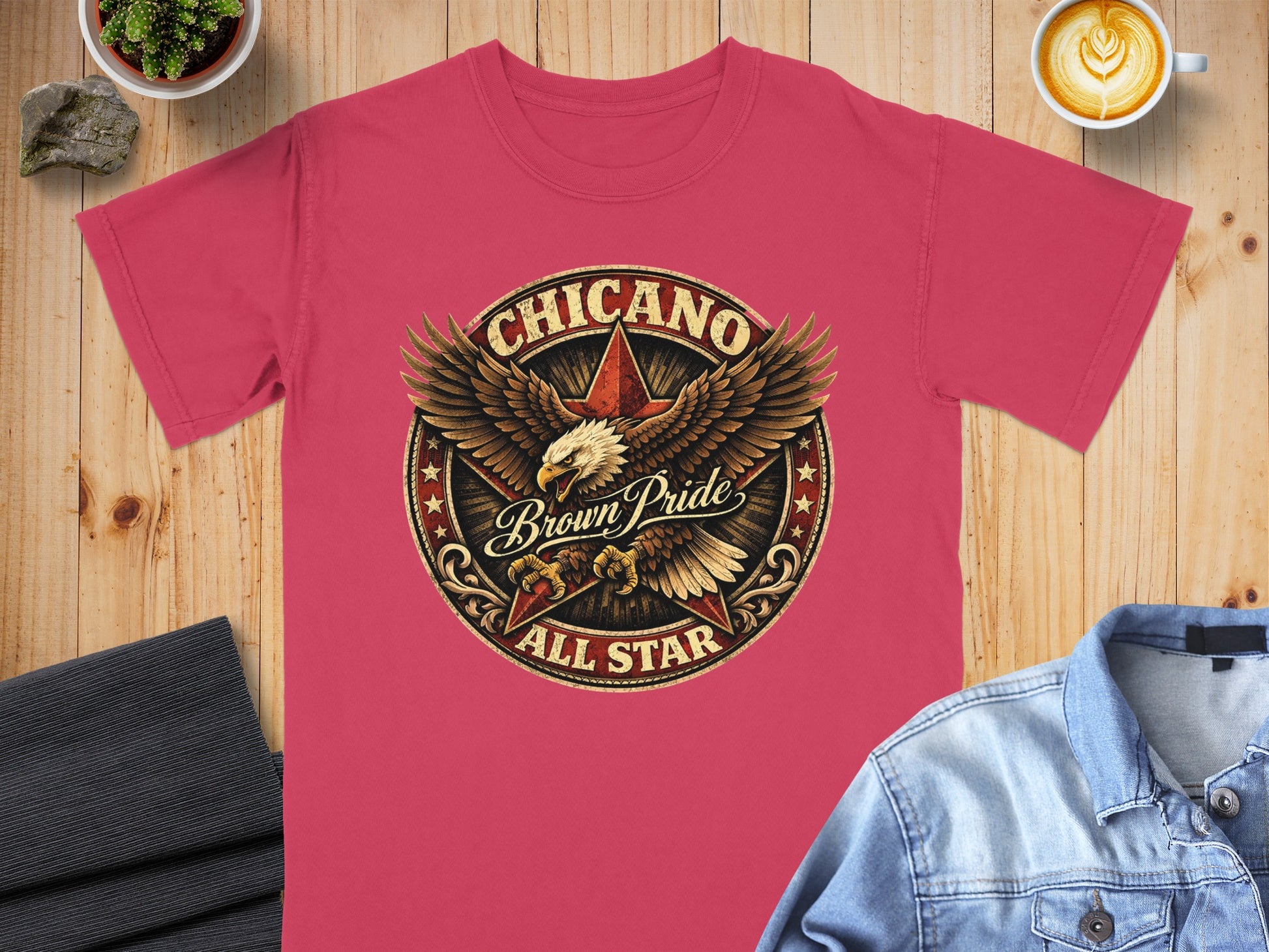 Red t-shirt with "Chicano Brown Pride All Star" eagle graphic and stars.
