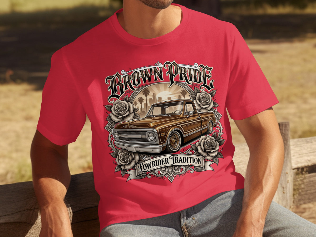 Red t-shirt with "Brown Pride Lowrider Tradition" graphic featuring a brown pickup truck and roses.