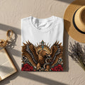 White t-shirt with an eagle and snake graphic, surrounded by roses and ornate details.