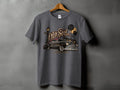 Dark grey t-shirt graphic with vintage car, palm trees, and 