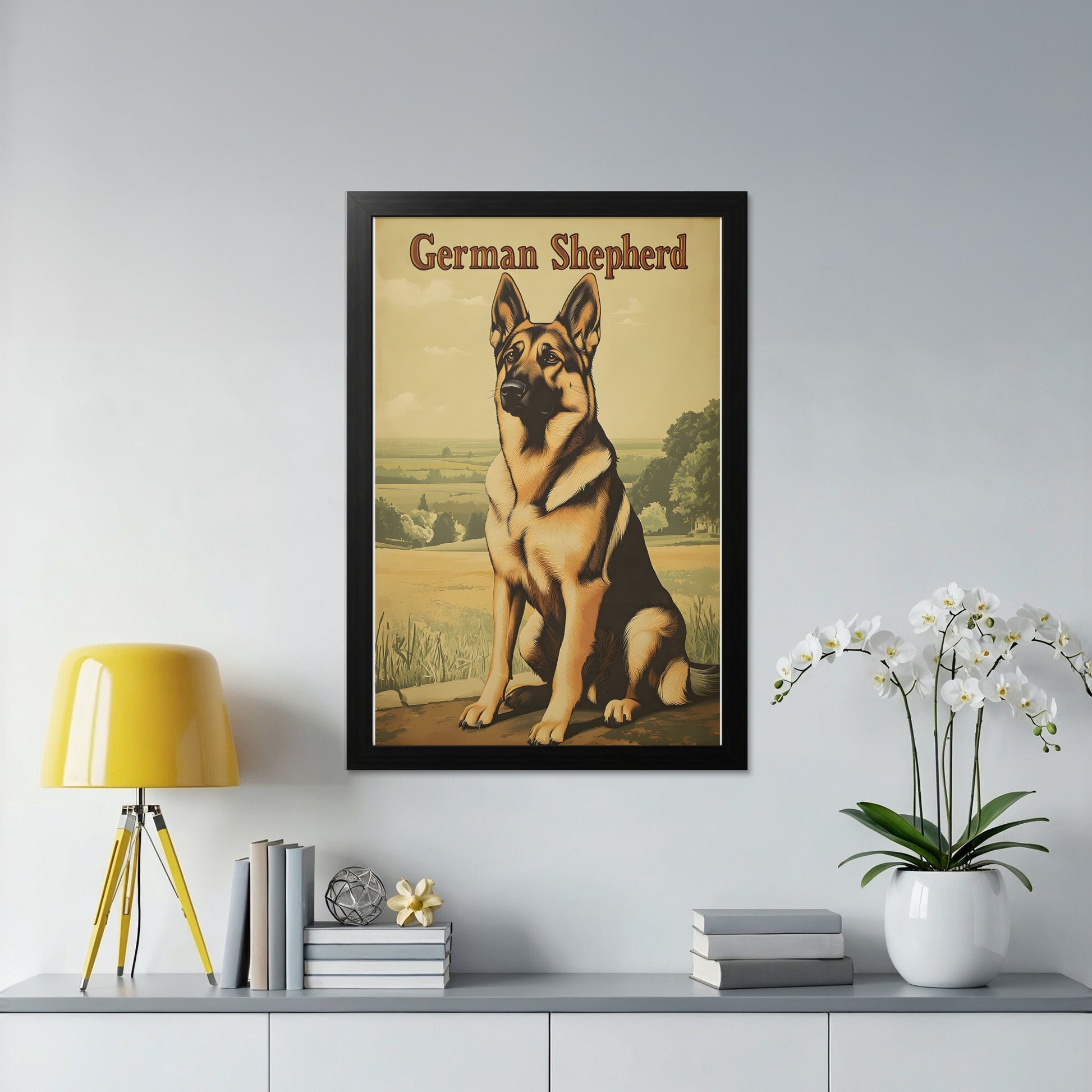 German Shepherd dog portrait in a framed poster on a white wall.