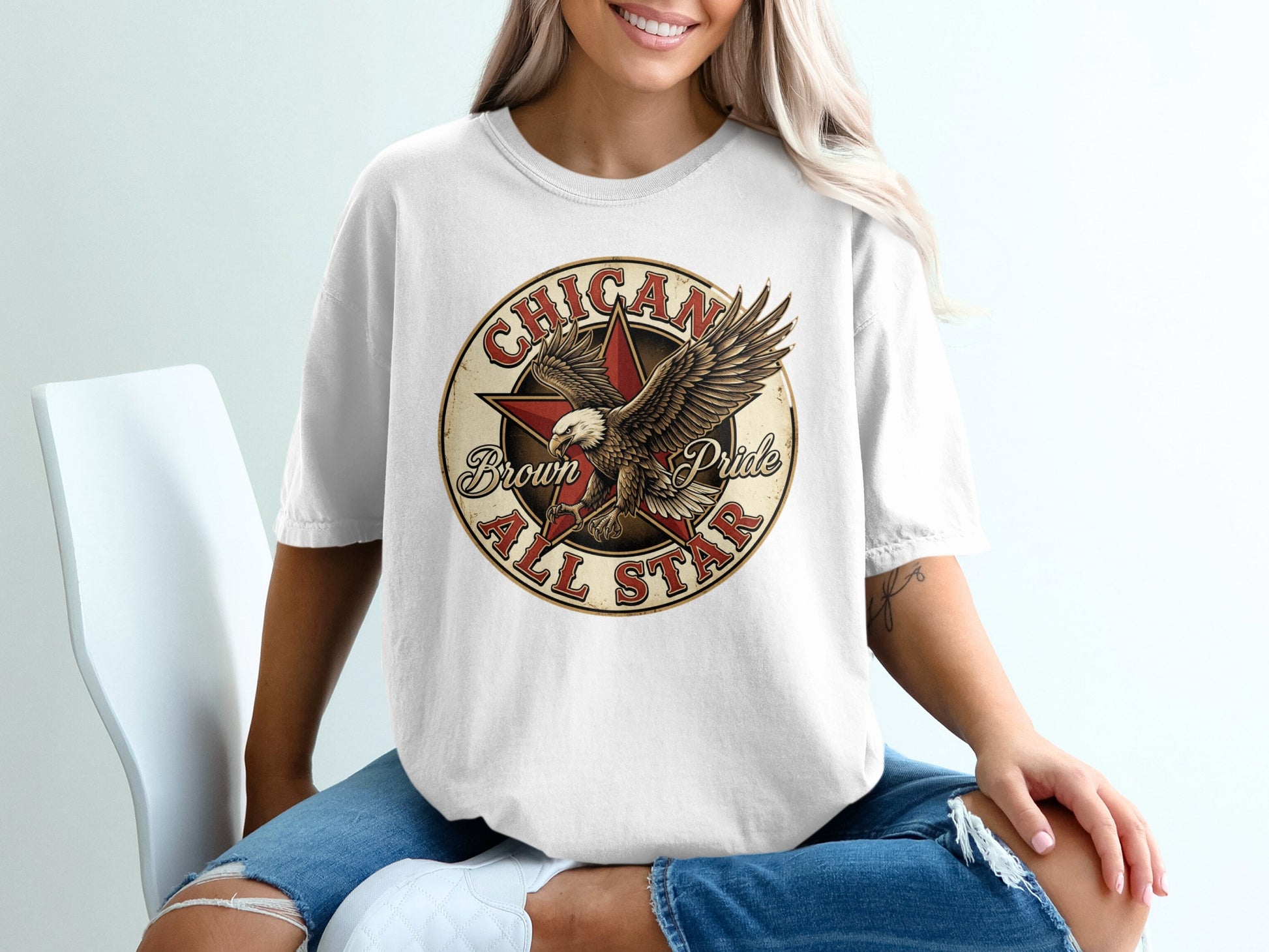 White t-shirt with "Chican Pride" and a star with an eagle.
