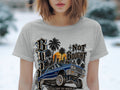 1963 Impala lowrider with city skyline, palm trees, and text 