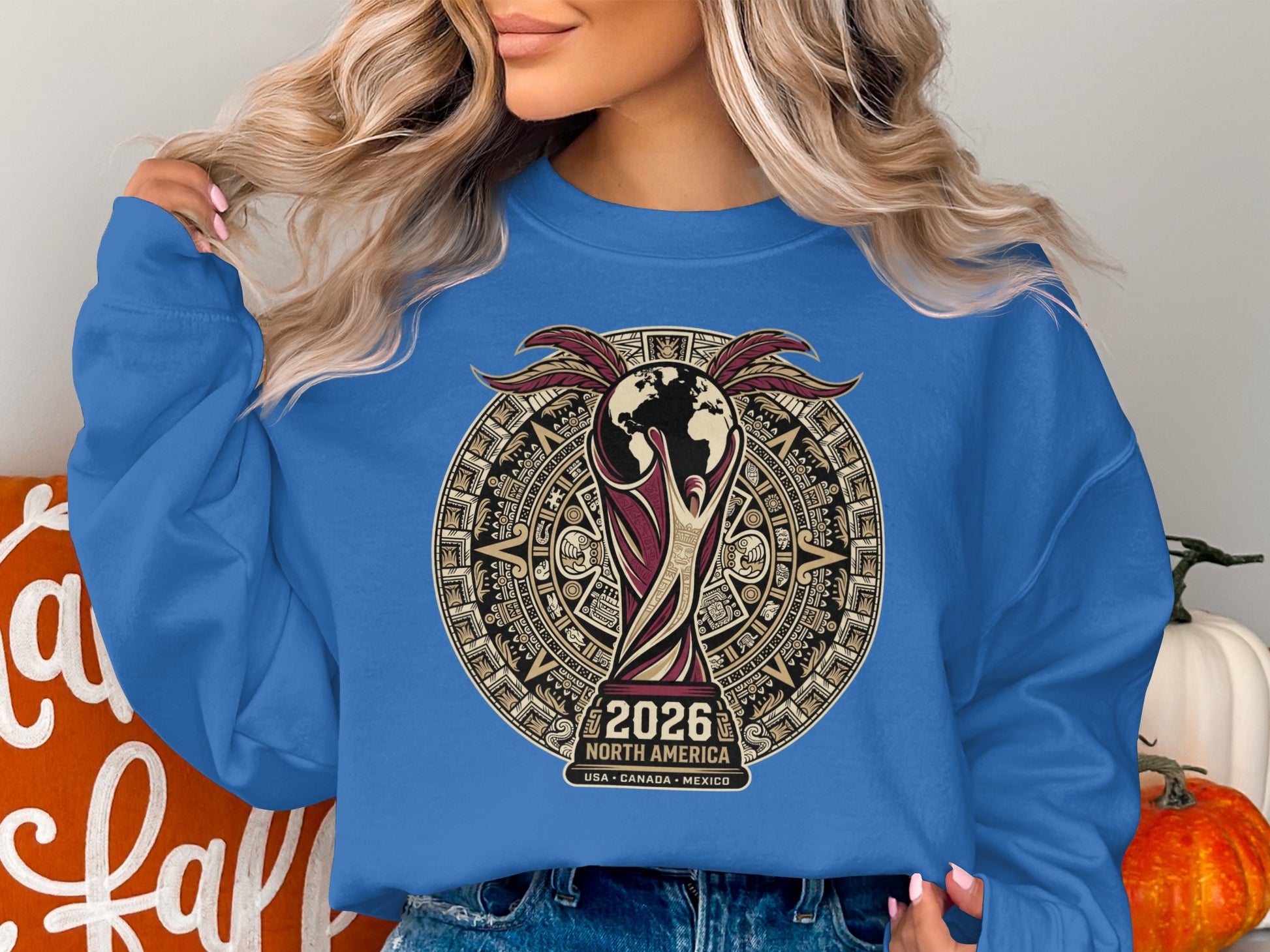 Blue sweatshirt with 2026 FIFA World Cup North America logo.