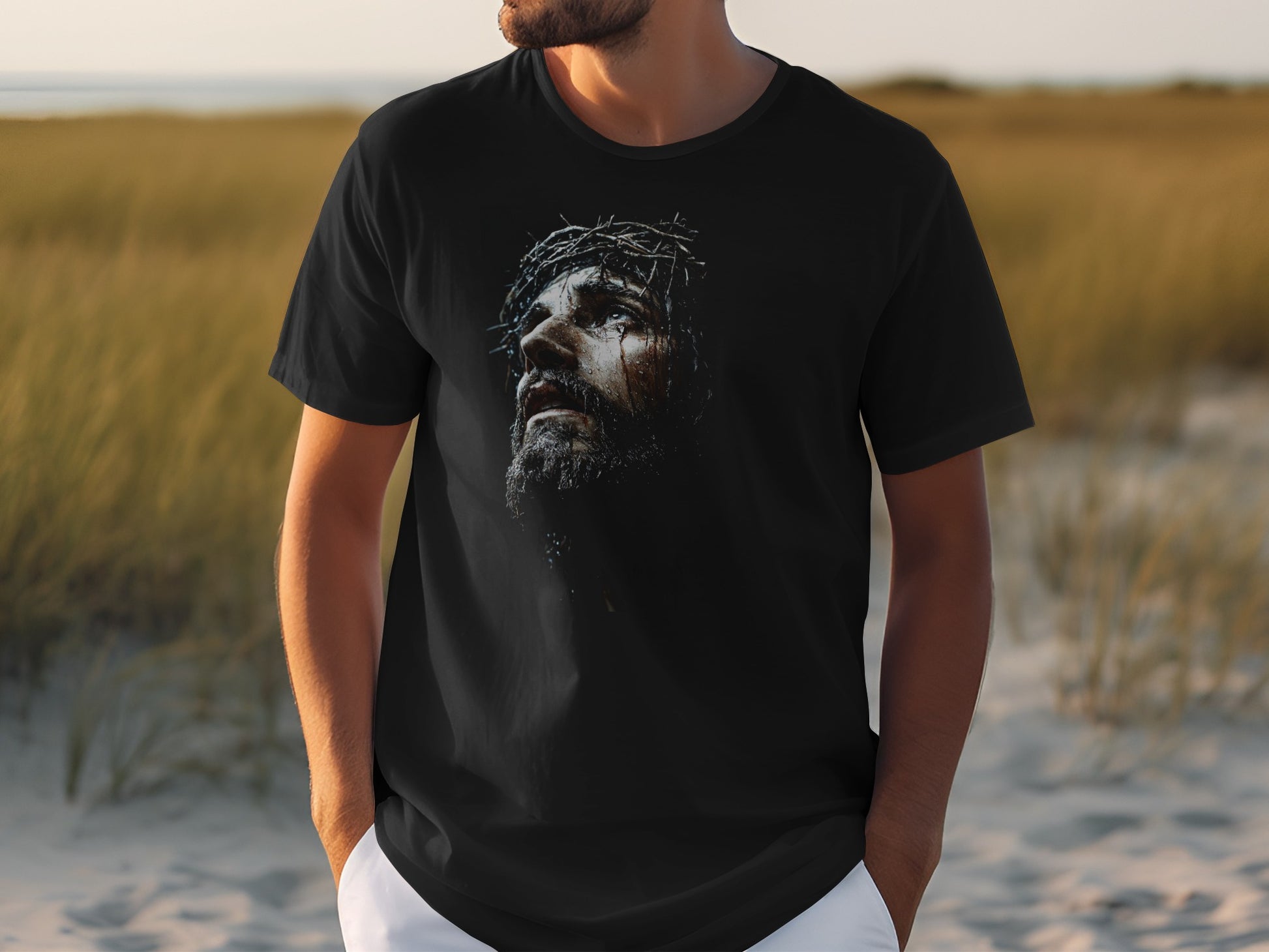 Black t-shirt featuring a close-up of Jesus wearing a crown of thorns.