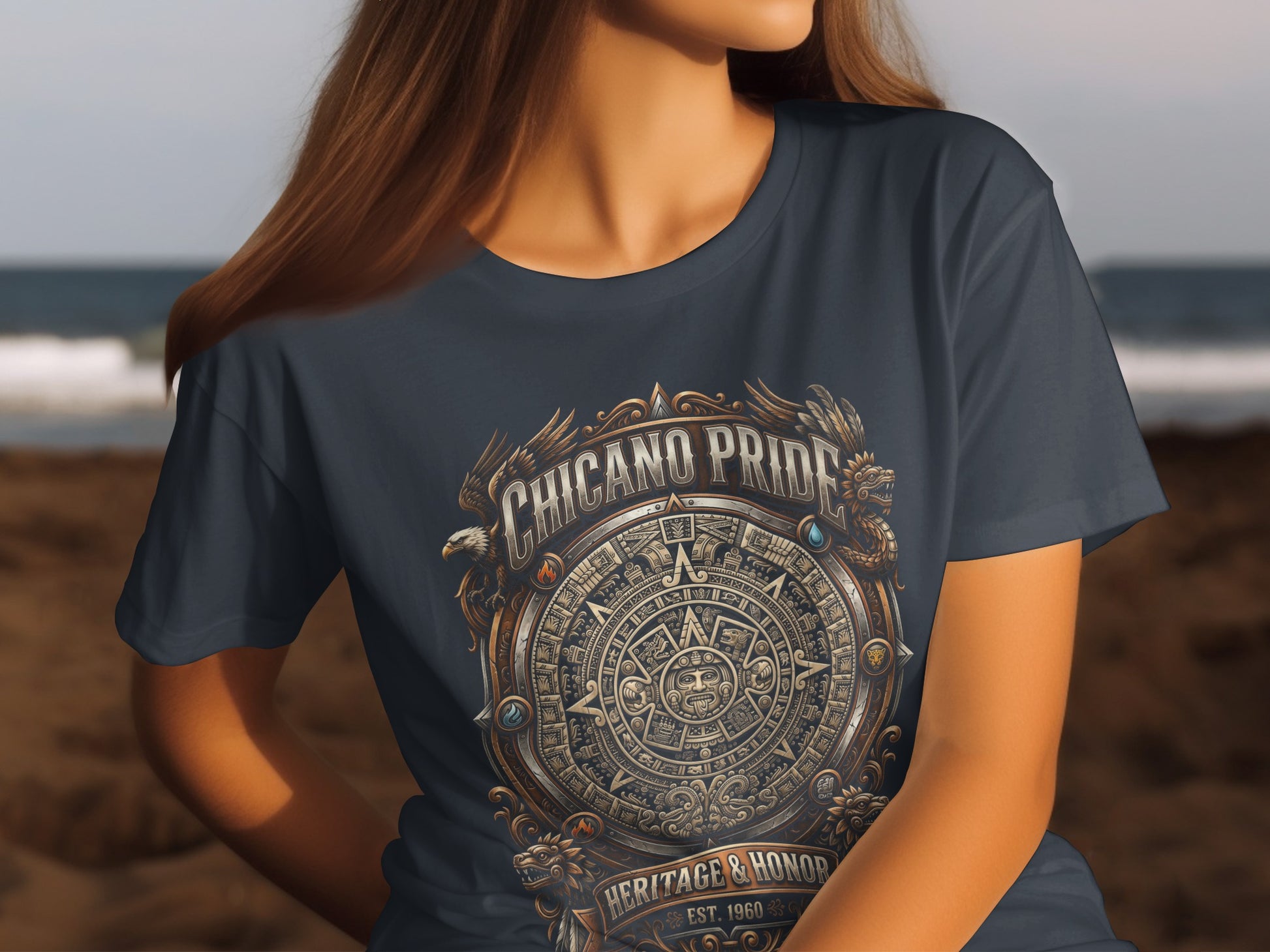 Dark t-shirt with "Chicano Pride" and Aztec calendar design.