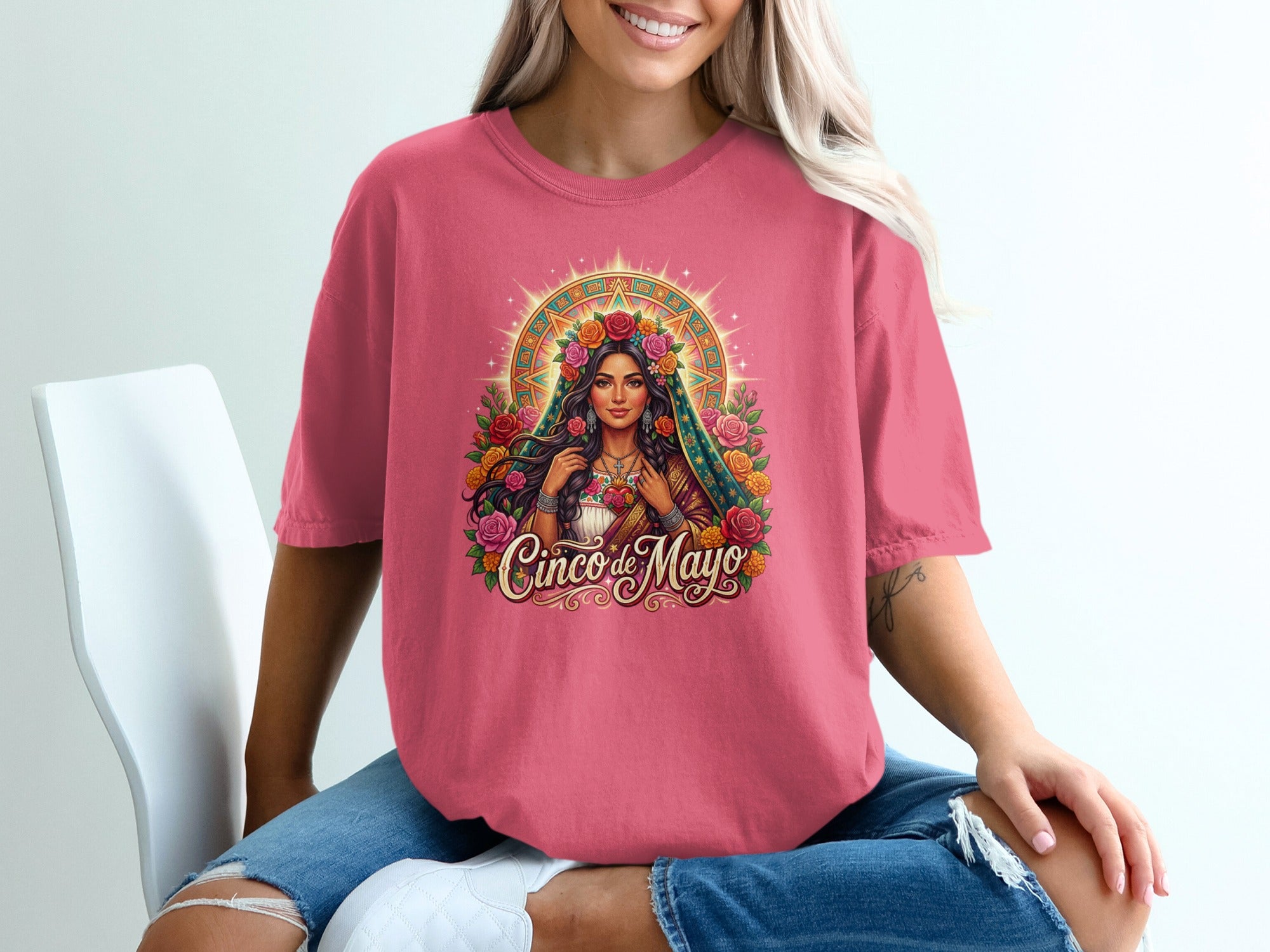 T-shirt with a graphic of a woman with flowers and a crown, celebrating Cinco de Mayo.