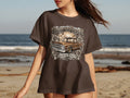 Brown Pride Lowrider Tradition graphic on a brown t-shirt.