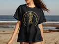 Black t-shirt with gold FIFA World Cup 2026 trophy logo.