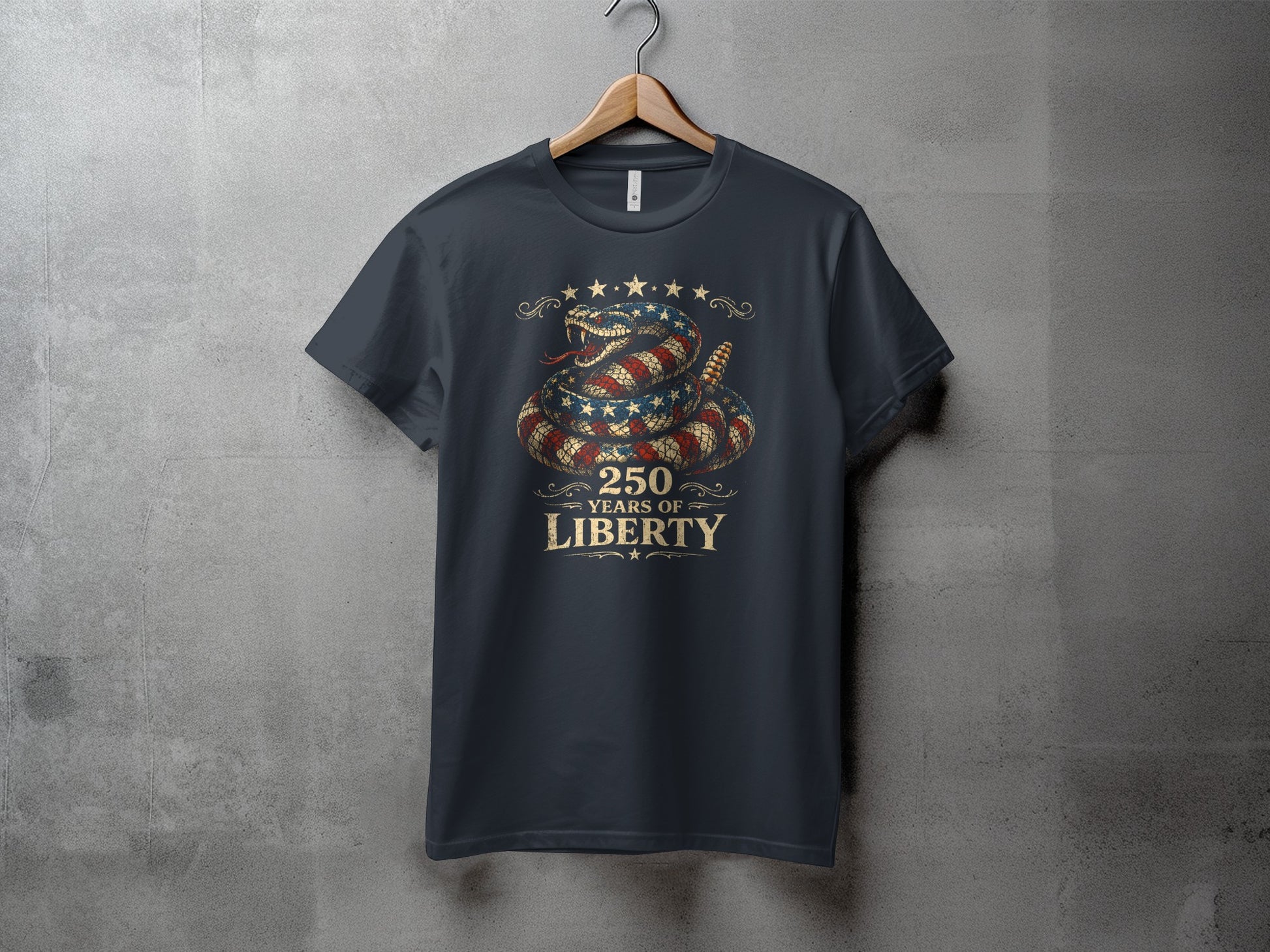 Dark t-shirt with a coiled snake in a US flag pattern, celebrating 250 Years of Liberty.