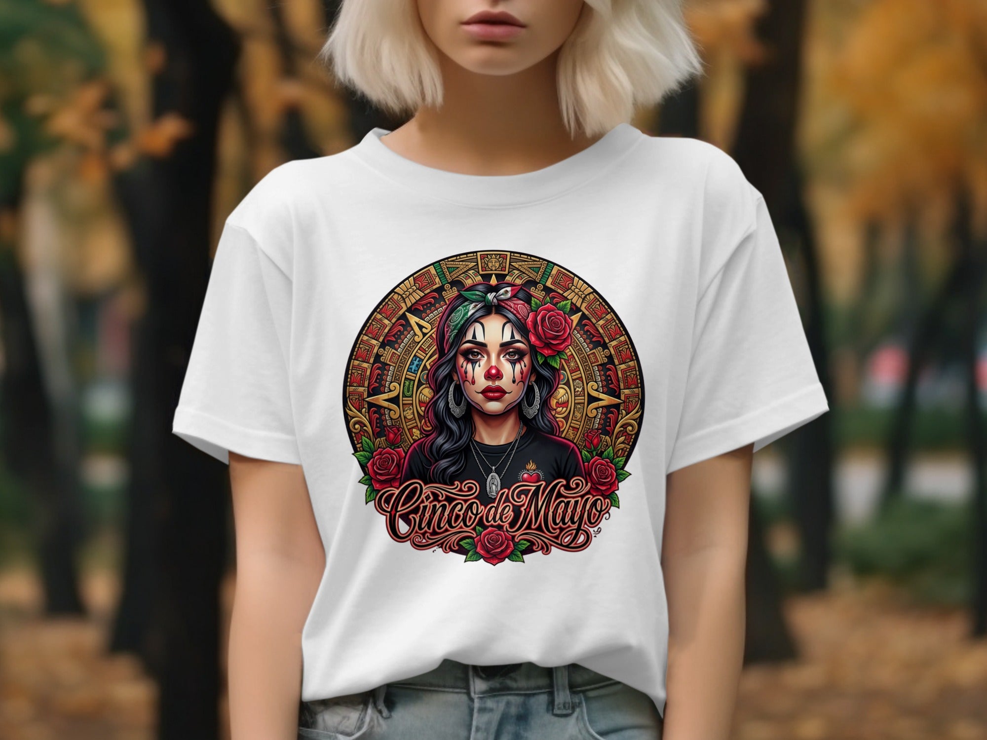 Woman wearing a white t-shirt with a Dia de Muertos skull graphic.