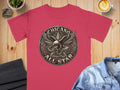Chicano All Star eagle and snake graphic on a pink t-shirt.