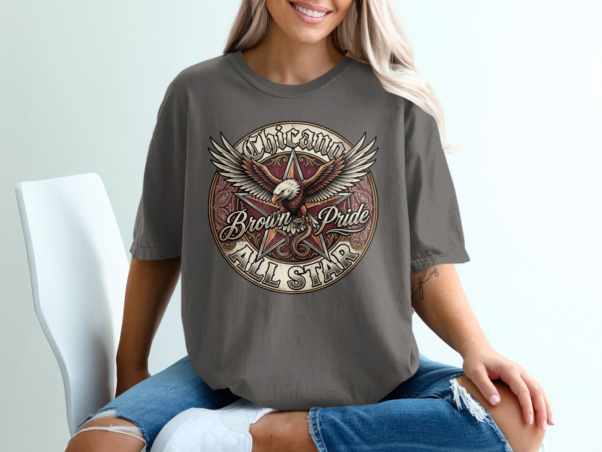 Brown All Star t-shirt with eagle and "Chicano Pride" text.