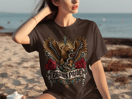 Brown t-shirt with an eagle, snake, roses, and "BROWN PRIDE" text.