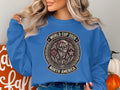 Blue sweatshirt with World Cup 2026 North America logo.