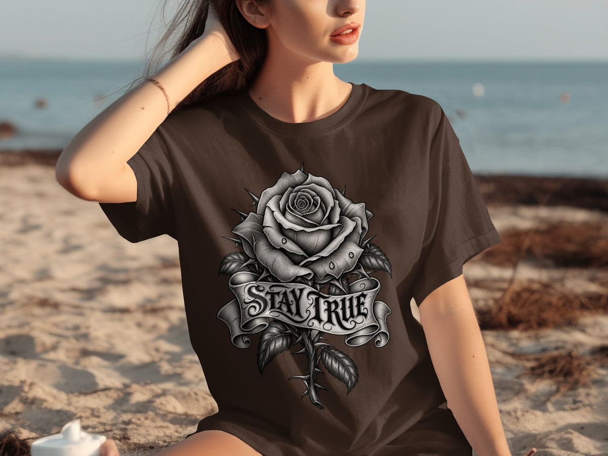 Brown t-shirt with a black and white rose design and "STAY TRUE" banner.