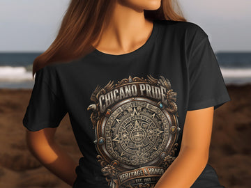 Black t-shirt with Chicano Pride Aztec calendar design and vintage details.