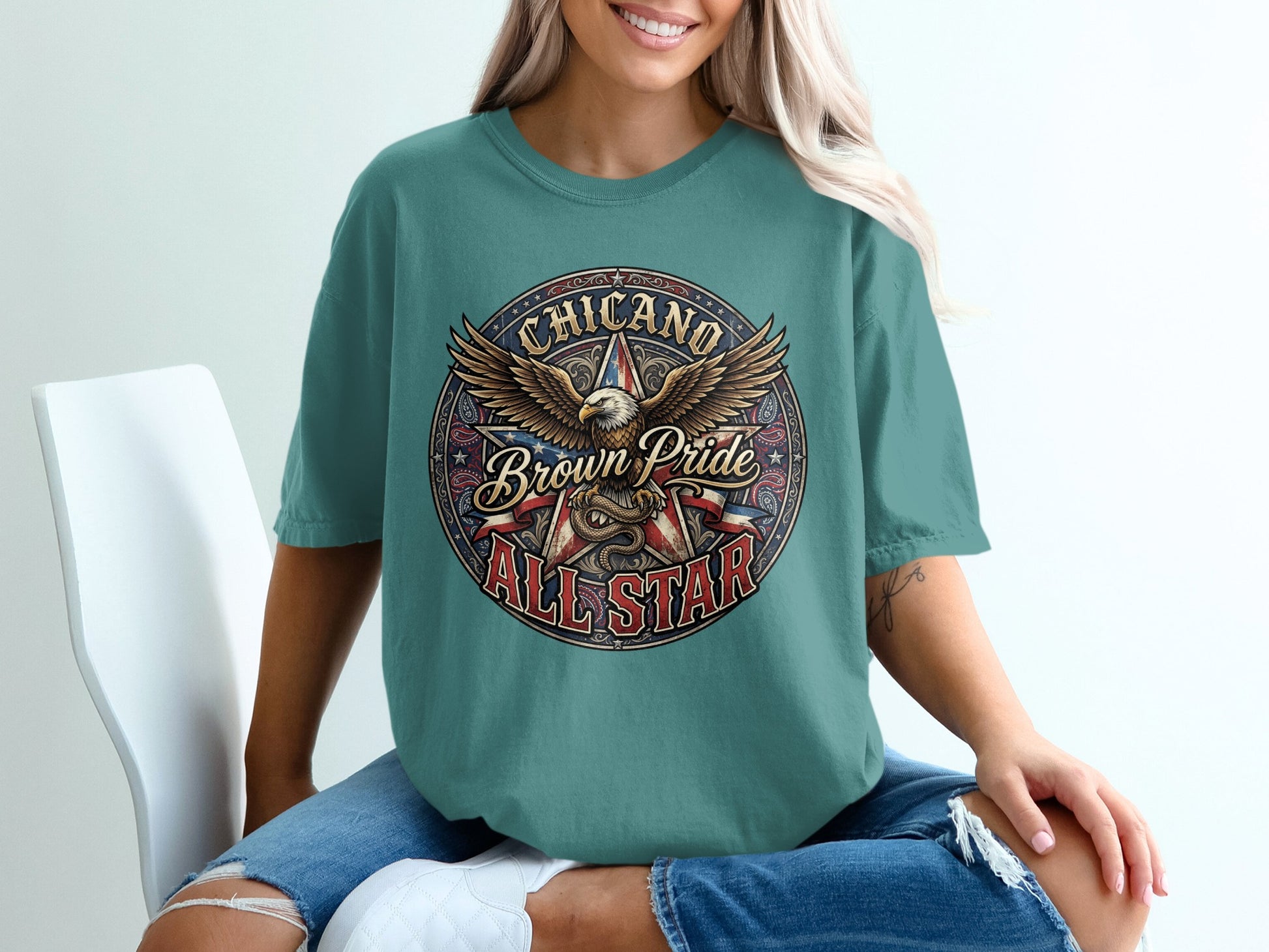 T-shirt with "Chicano Brown Pride All Star" text and eagle graphic.