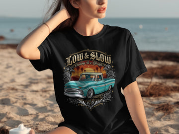 Black t-shirt with Low & Slow Cruising Is a Lifestyle graphic and teal pickup truck.