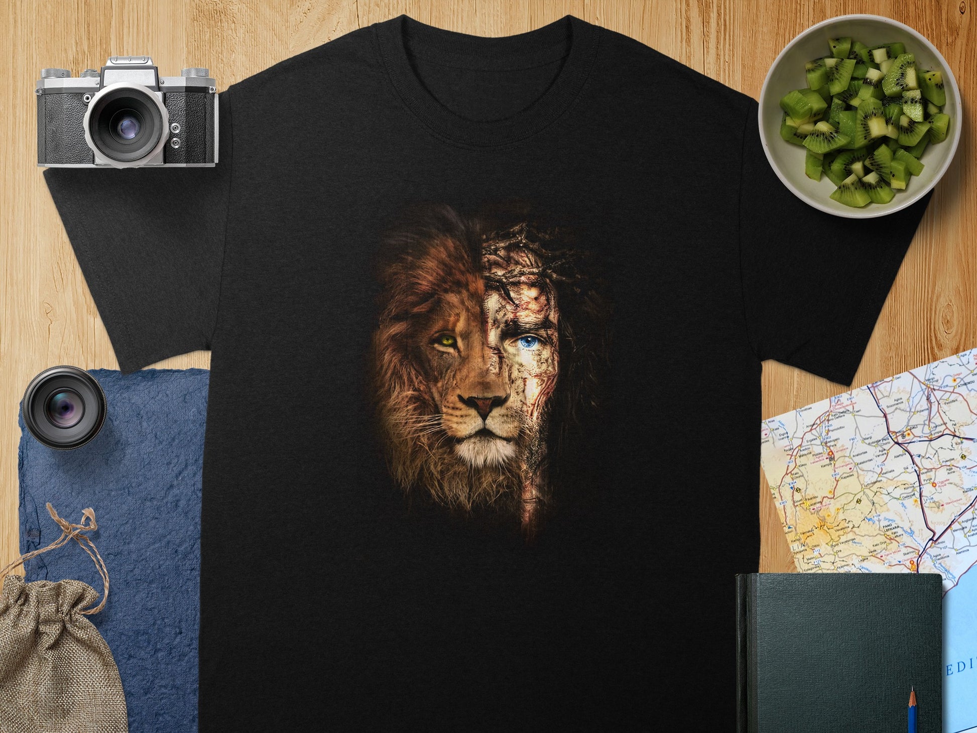 T-shirt with split design: lion's face on left, Jesus' face on right.
