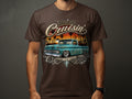 Aztlán Cruisin' graphic on a brown t-shirt featuring a teal classic Chevrolet truck.